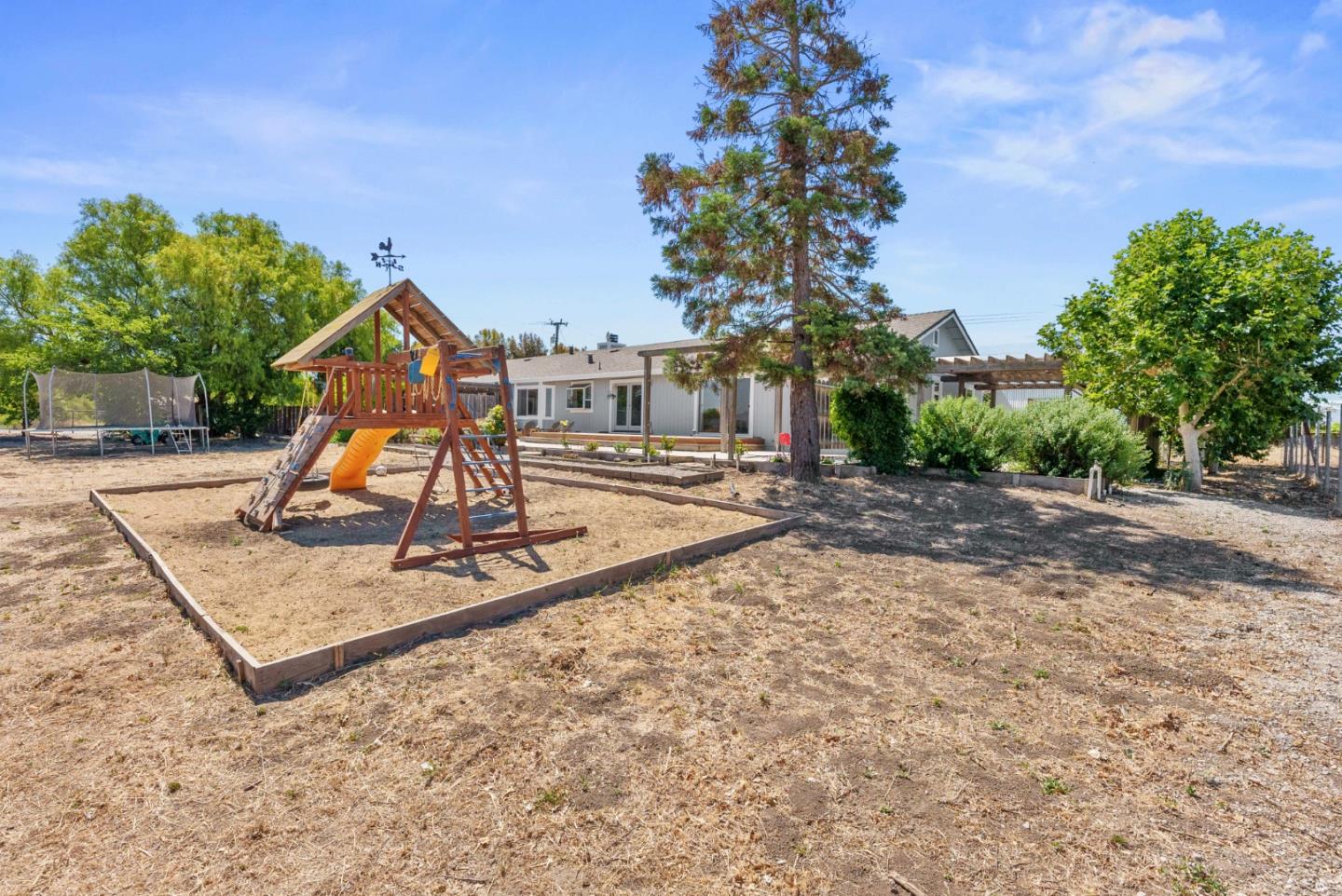 1150 Wright Road Hollister, CA 95023 - Photo 12 of 68 a small garden covered with tall trees