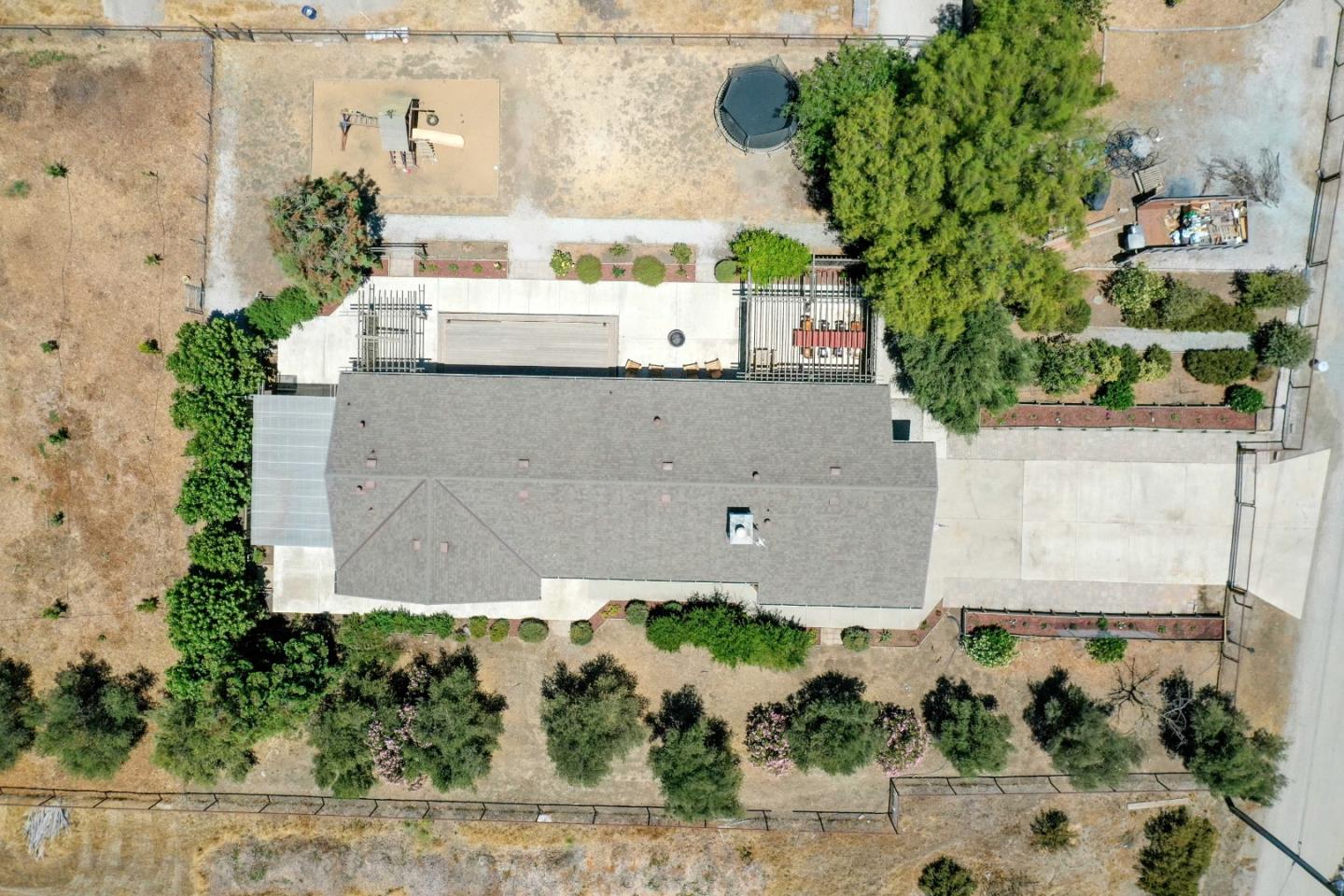 1150 Wright Road Hollister, CA 95023 - Photo 14 of 68 an aerial view of a house with a yard and plants