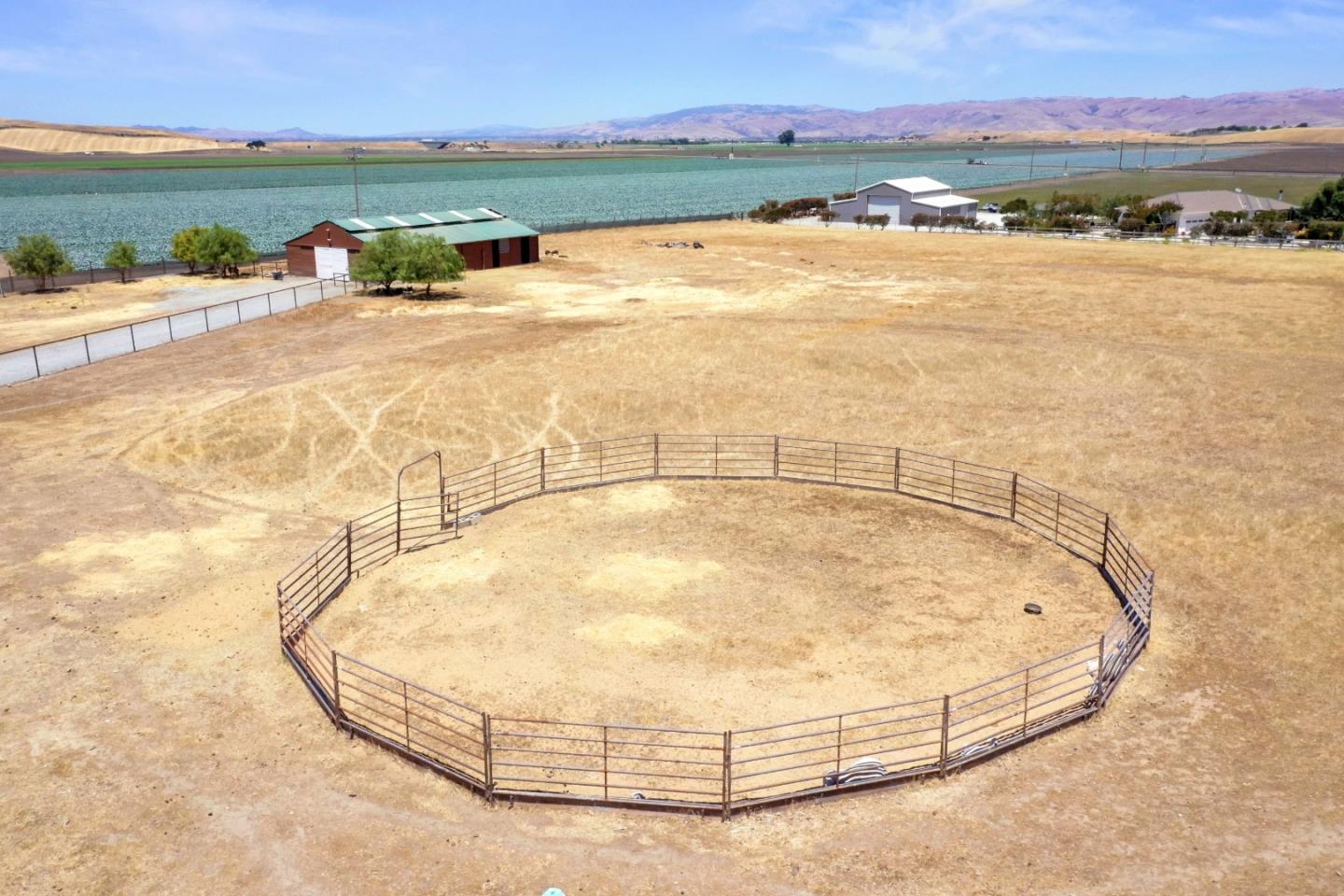 1150 Wright Road Hollister, CA 95023 - Photo 18 of 68 a view of a swimming pool with an ocean view