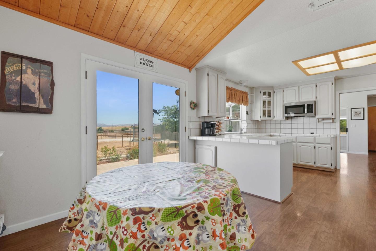1150 Wright Road Hollister, CA 95023 - Photo 34 of 68 a kitchen with a stove a sink a refrigerator and a microwave