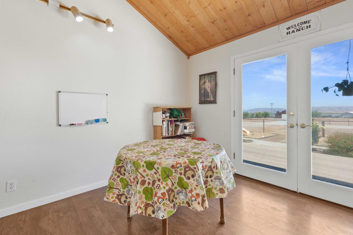 1150 Wright Road Hollister, CA 95023 - Photo 38 of 68 a bedroom with a bed and a view of kitchen