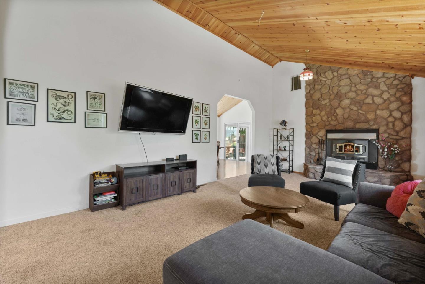 1150 Wright Road Hollister, CA 95023 - Photo 40 of 68 a living room with furniture and a flat screen tv