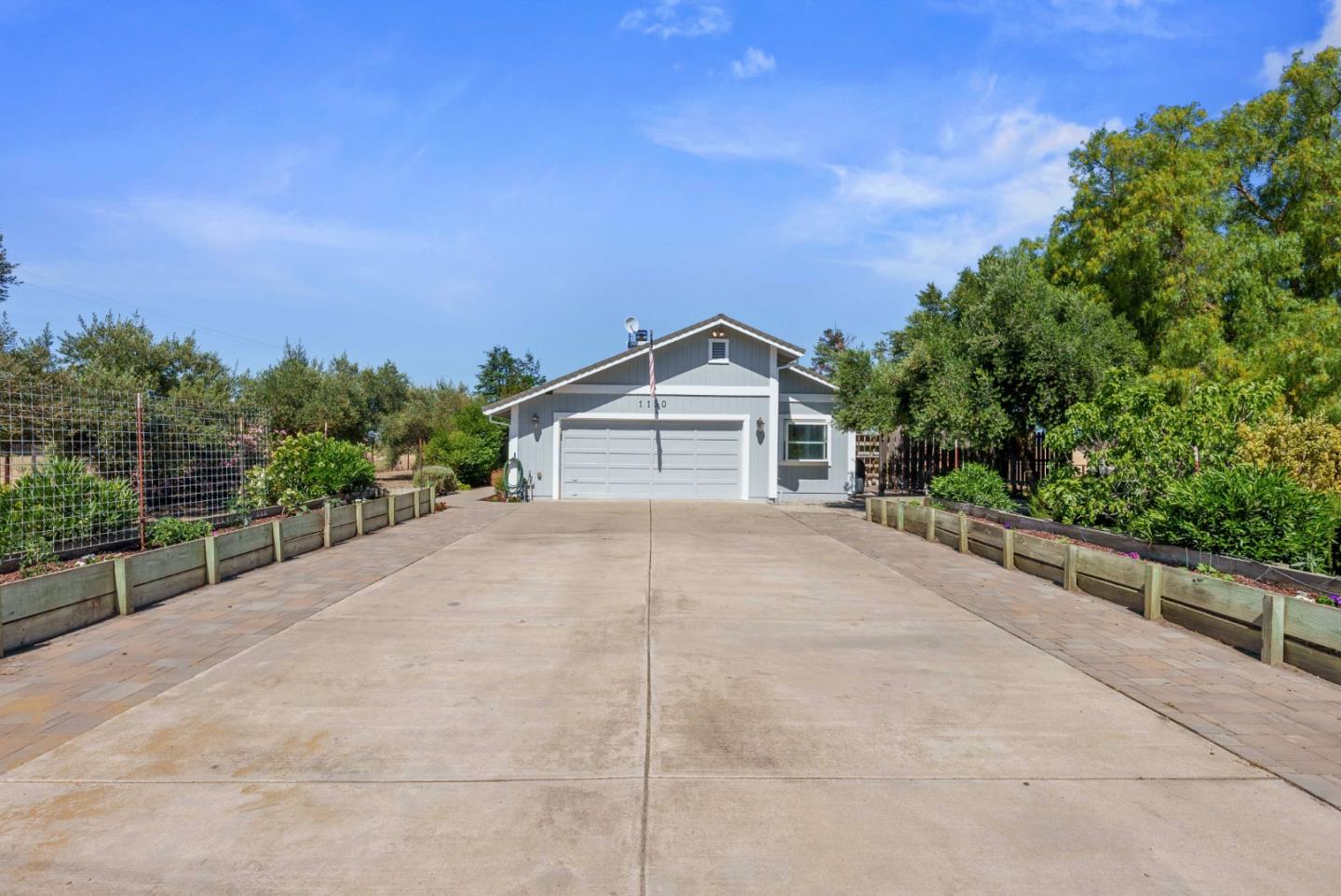 1150 Wright Road Hollister, CA 95023 - Photo 4 of 68 a view of house and outdoor space with wooden fence