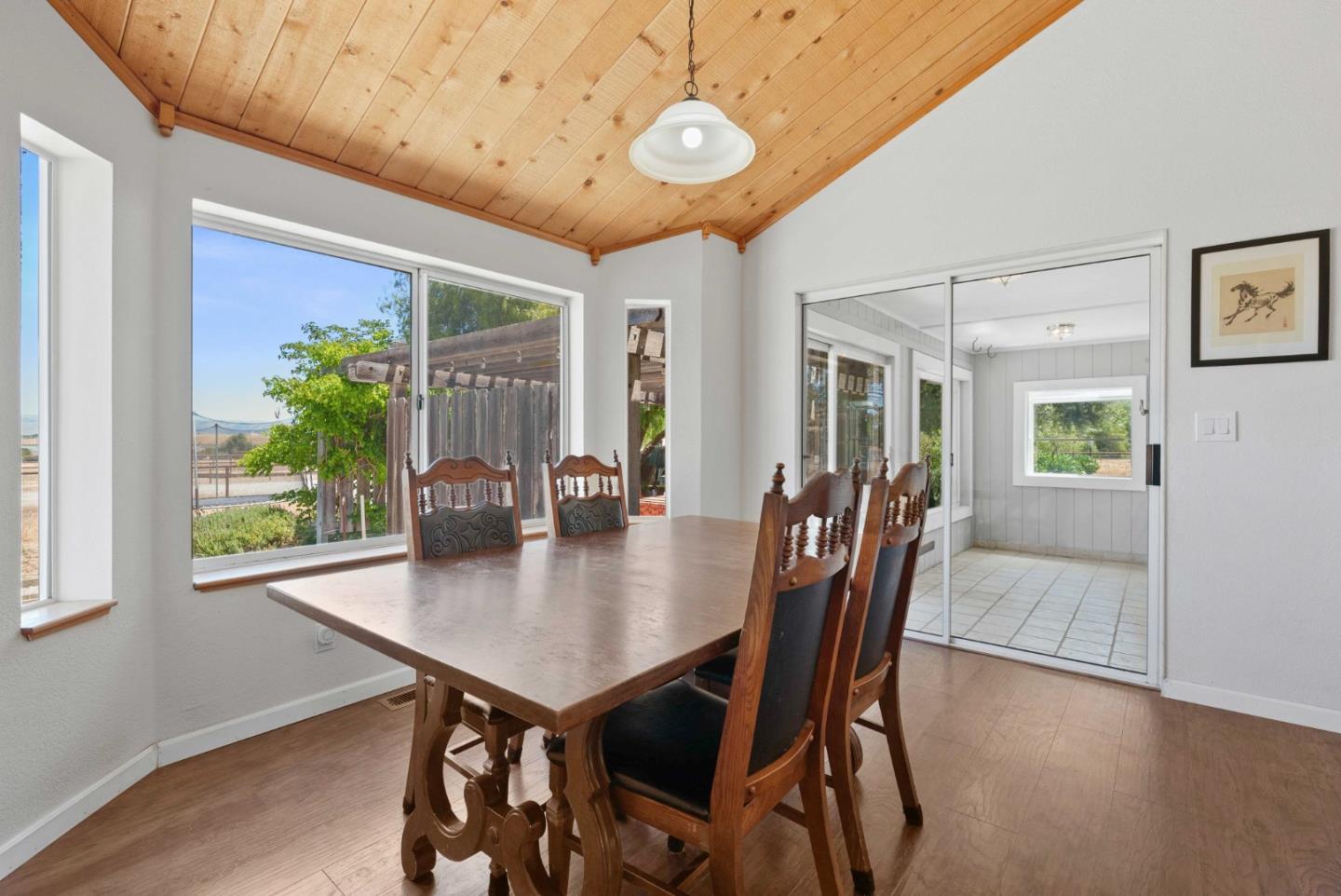 1150 Wright Road Hollister, CA 95023 - Photo 43 of 68 a view of a dining room with furniture window and wooden floor