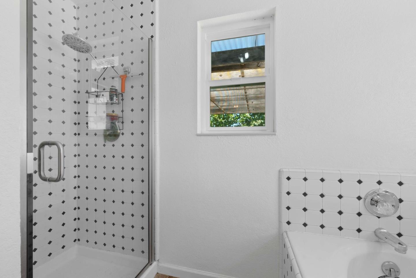 1150 Wright Road Hollister, CA 95023 - Photo 53 of 68 a bathroom with a shower and a window