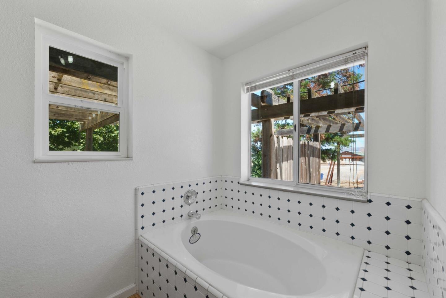 1150 Wright Road Hollister, CA 95023 - Photo 54 of 68 a bathroom with a sink and a bathtub