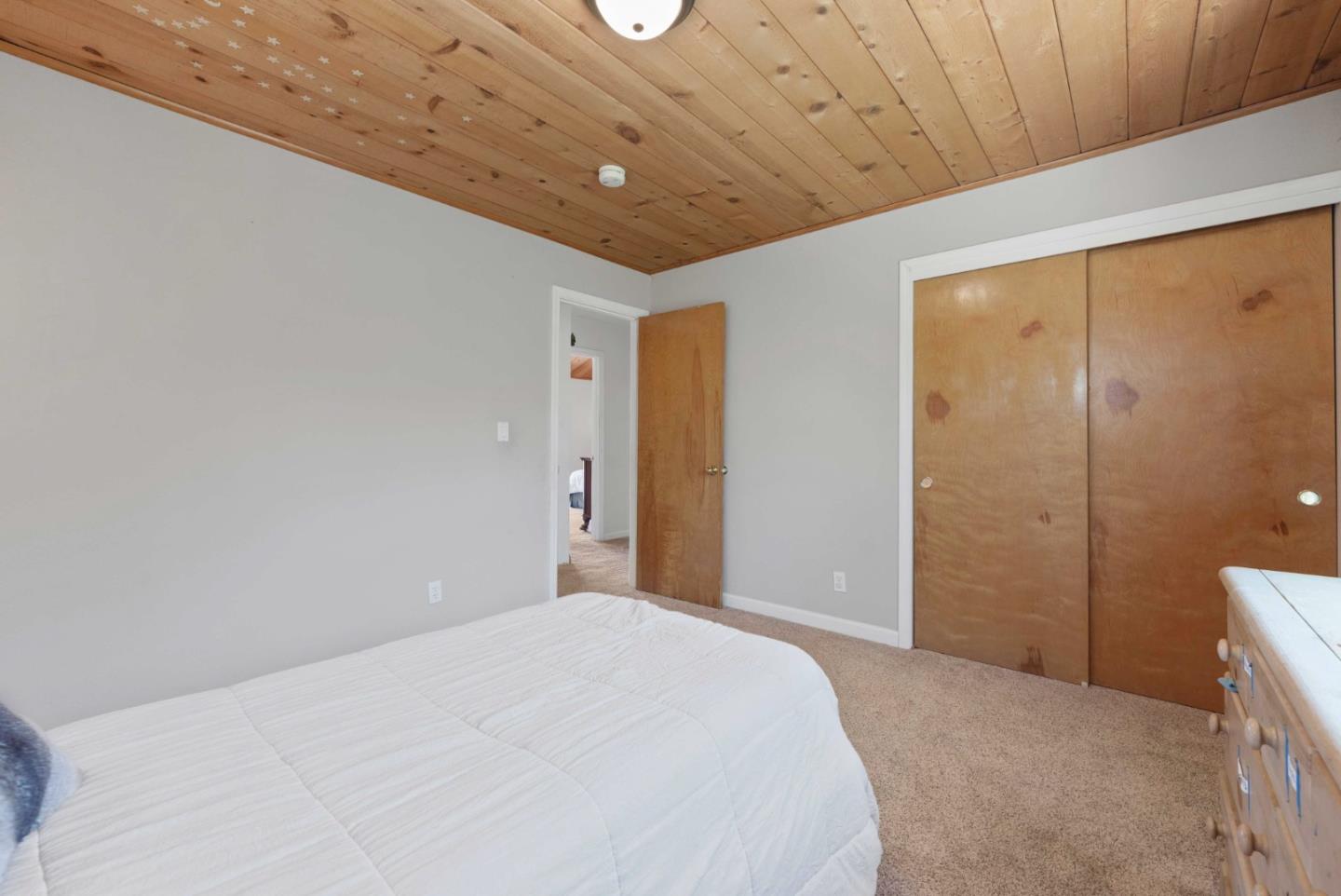 1150 Wright Road Hollister, CA 95023 - Photo 56 of 68 a bedroom with a bed and a large window