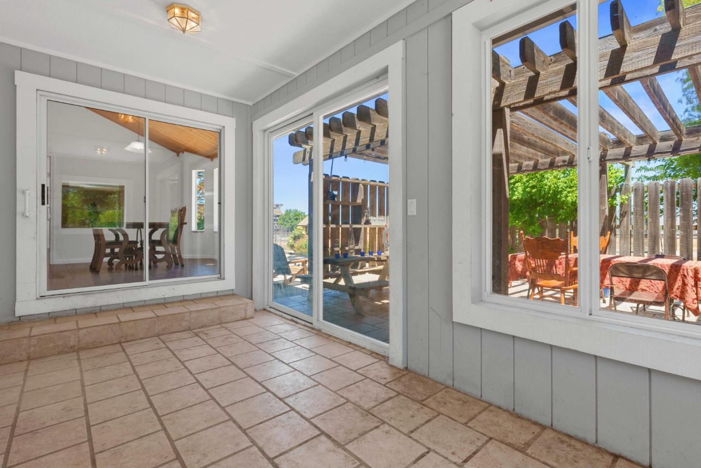 1150 Wright Road Hollister, CA 95023 - Photo 63 of 68 a view of an entryway with a flower garden and front door