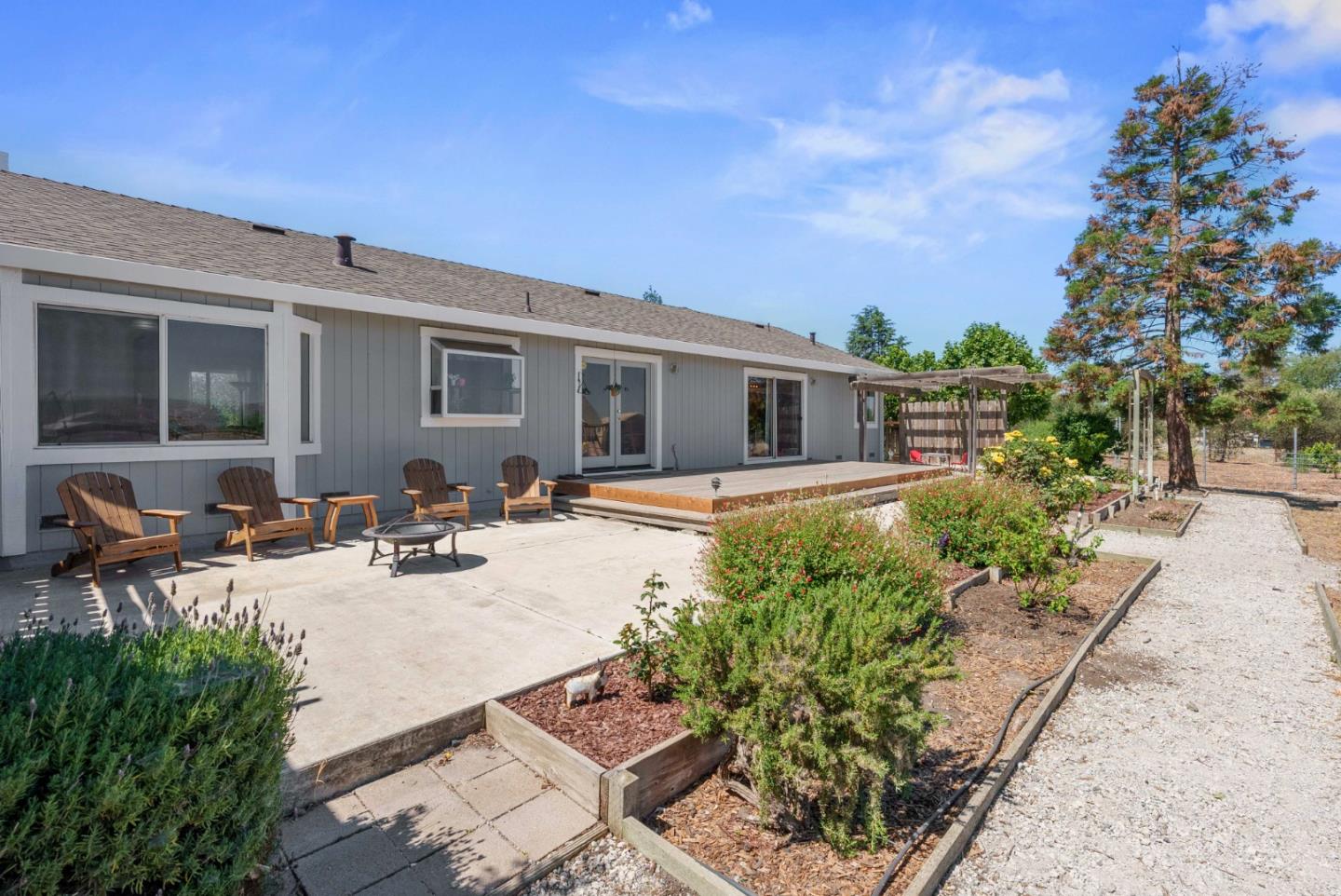 1150 Wright Road Hollister, CA 95023 - Photo 8 of 68 a view of a yard with furniture and a garden
