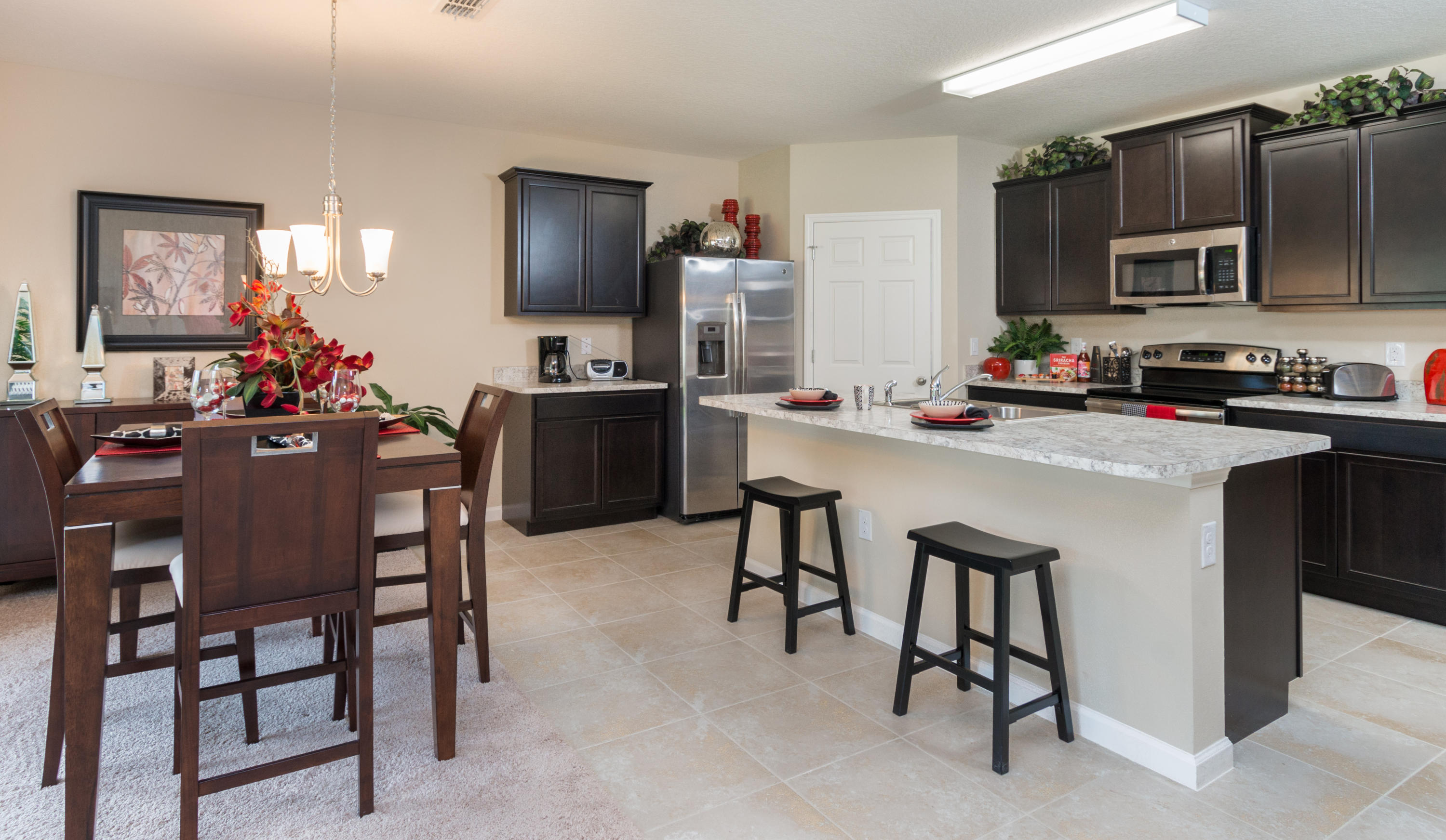 909 Southwest Fenway Road Port St. Lucie, FL 34953 - Photo 3 of 5 Kitchen - Dining room