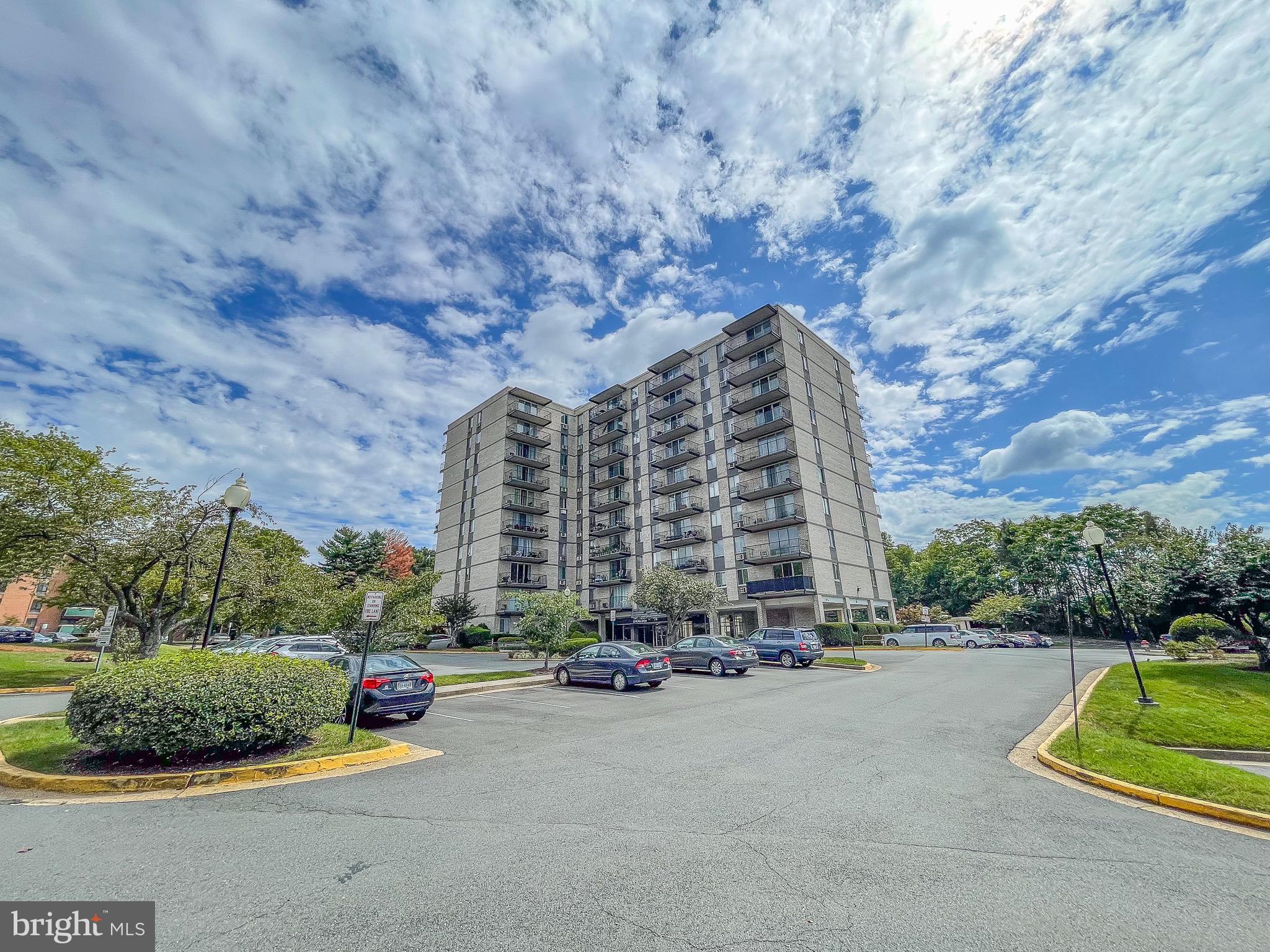 3245 Rio Drive, Unit 610 Falls Church, VA 22041 - Photo 2 of 27 a view of a building with a garden and pathway