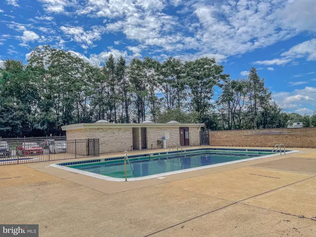 a view of a house with a swimming pool