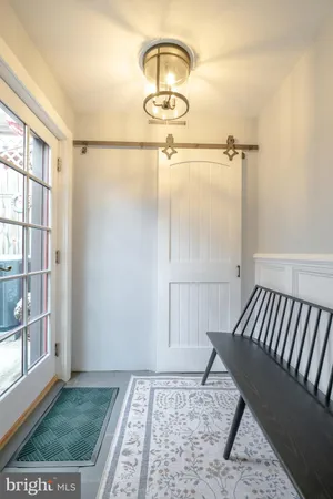 a view of staircase with a rug
