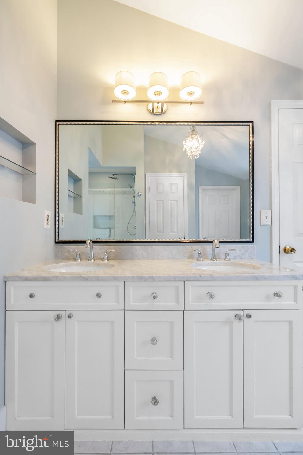 908 South Front Street Philadelphia, PA 19147 - Photo 17 of 27 a bathroom with a sink and mirror