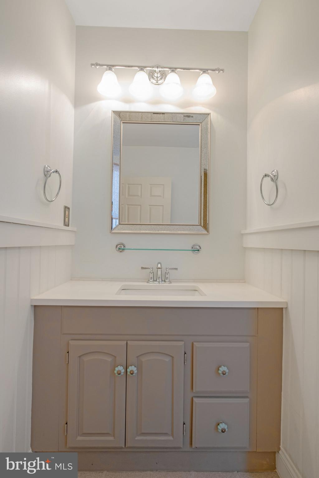 908 South Front Street Philadelphia, PA 19147 - Photo 22 of 27 a bathroom with a sink vanity and mirror