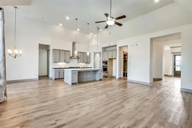 a view of a house with garden and yard