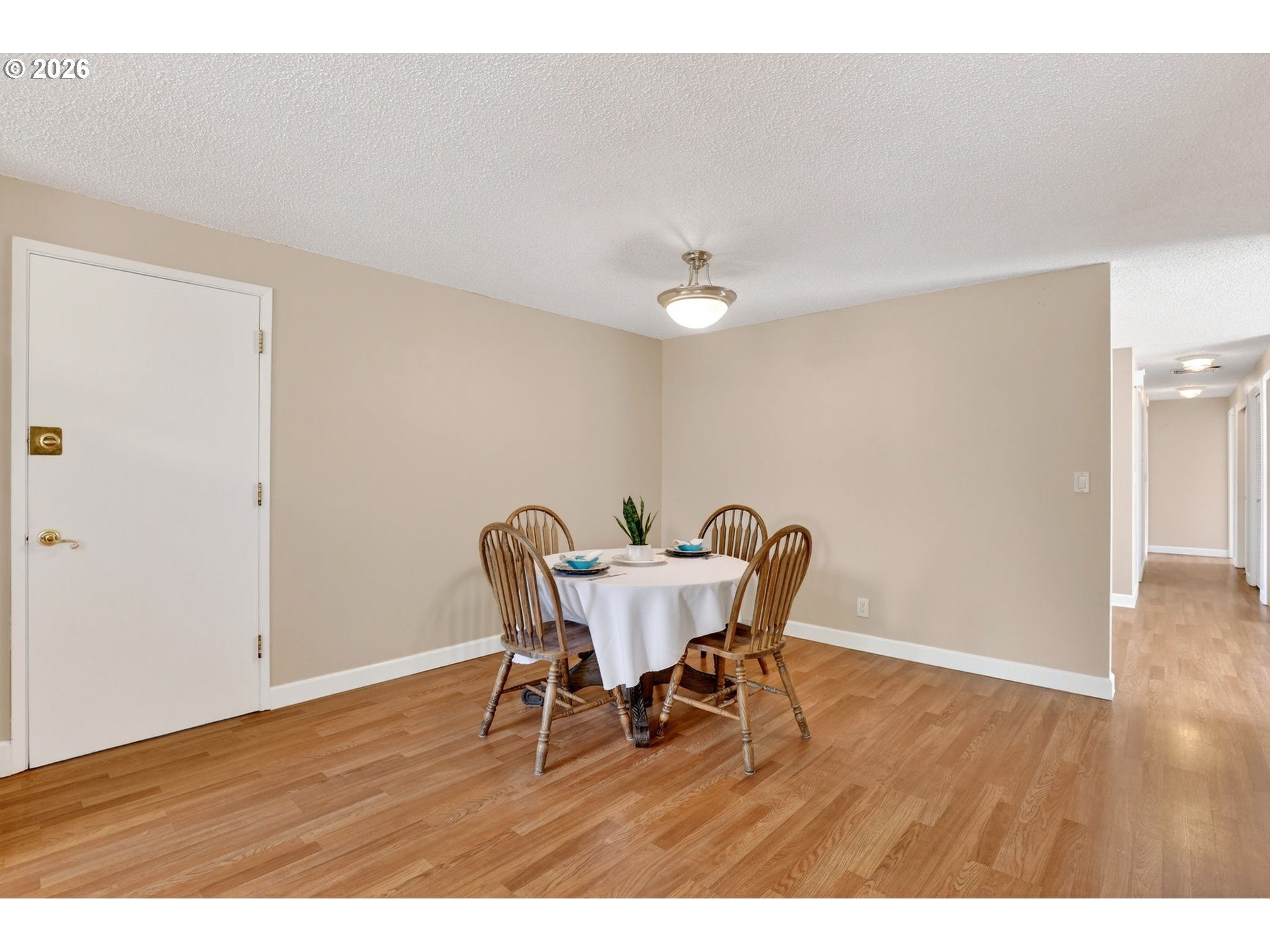 640 Stonehill Street Gladstone, OR 97027 - Photo 11 of 48 a view of a dining room with furniture and wooden floor
