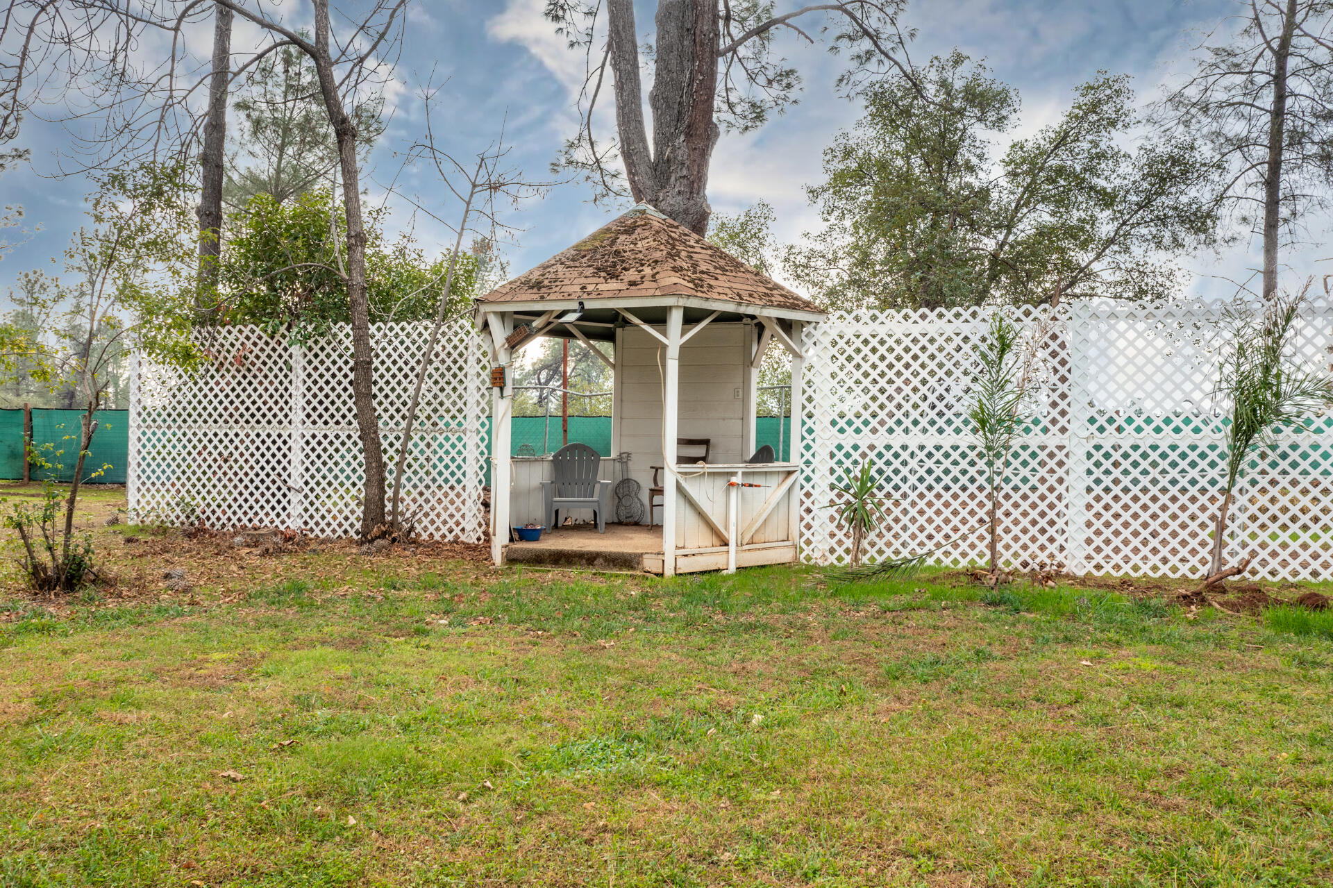 6188 Happy Valley Road Anderson, CA 96007 - Photo 15 of 58 a front view of a house with a yard