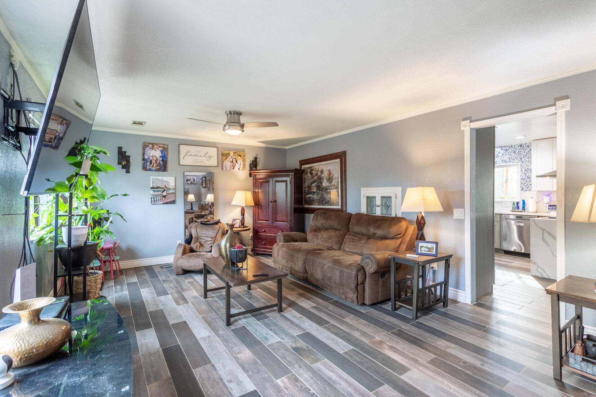 6188 Happy Valley Road Anderson, CA 96007 - Photo 18 of 58 a living room with furniture and a wooden floor