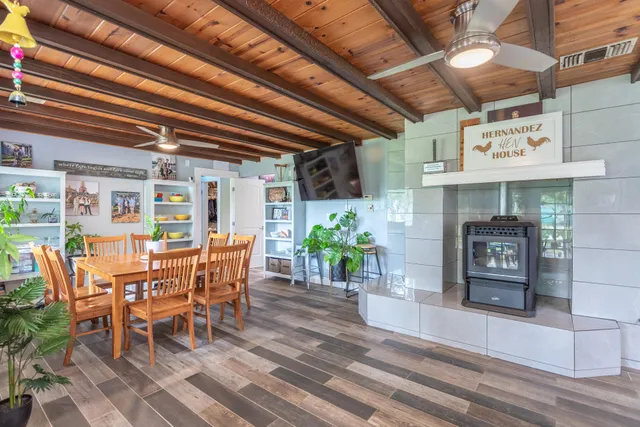 a kitchen with a sink and large window