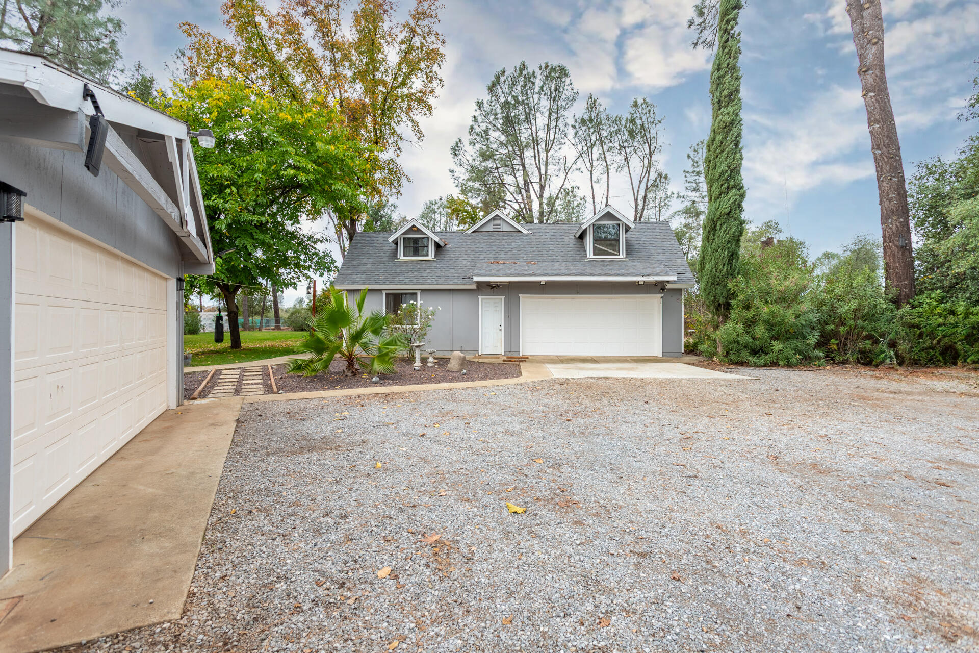 6188 Happy Valley Road Anderson, CA 96007 - Photo 2 of 58 front view of a house with a street