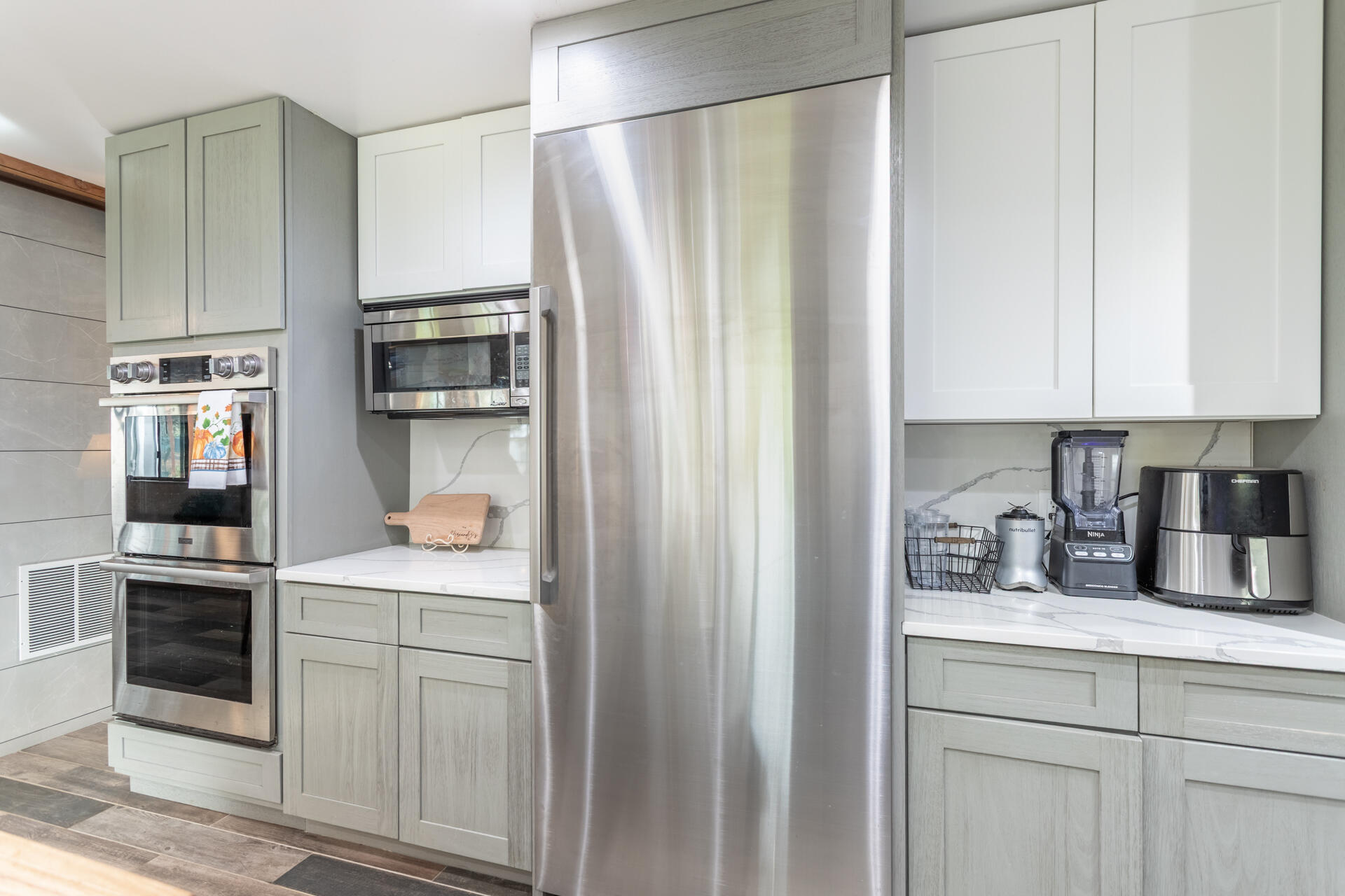 6188 Happy Valley Road Anderson, CA 96007 - Photo 27 of 58 a kitchen with stainless steel appliances a refrigerator sink and cabinets