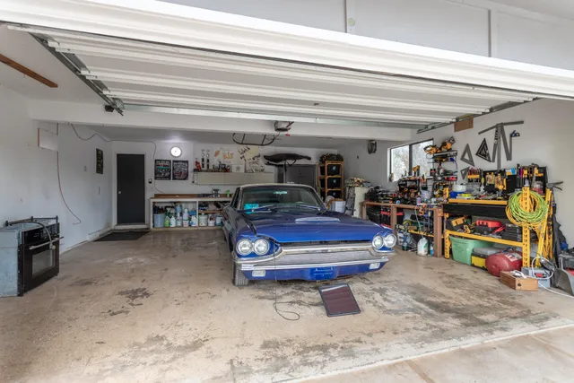 a room with lots of furniture and clutter