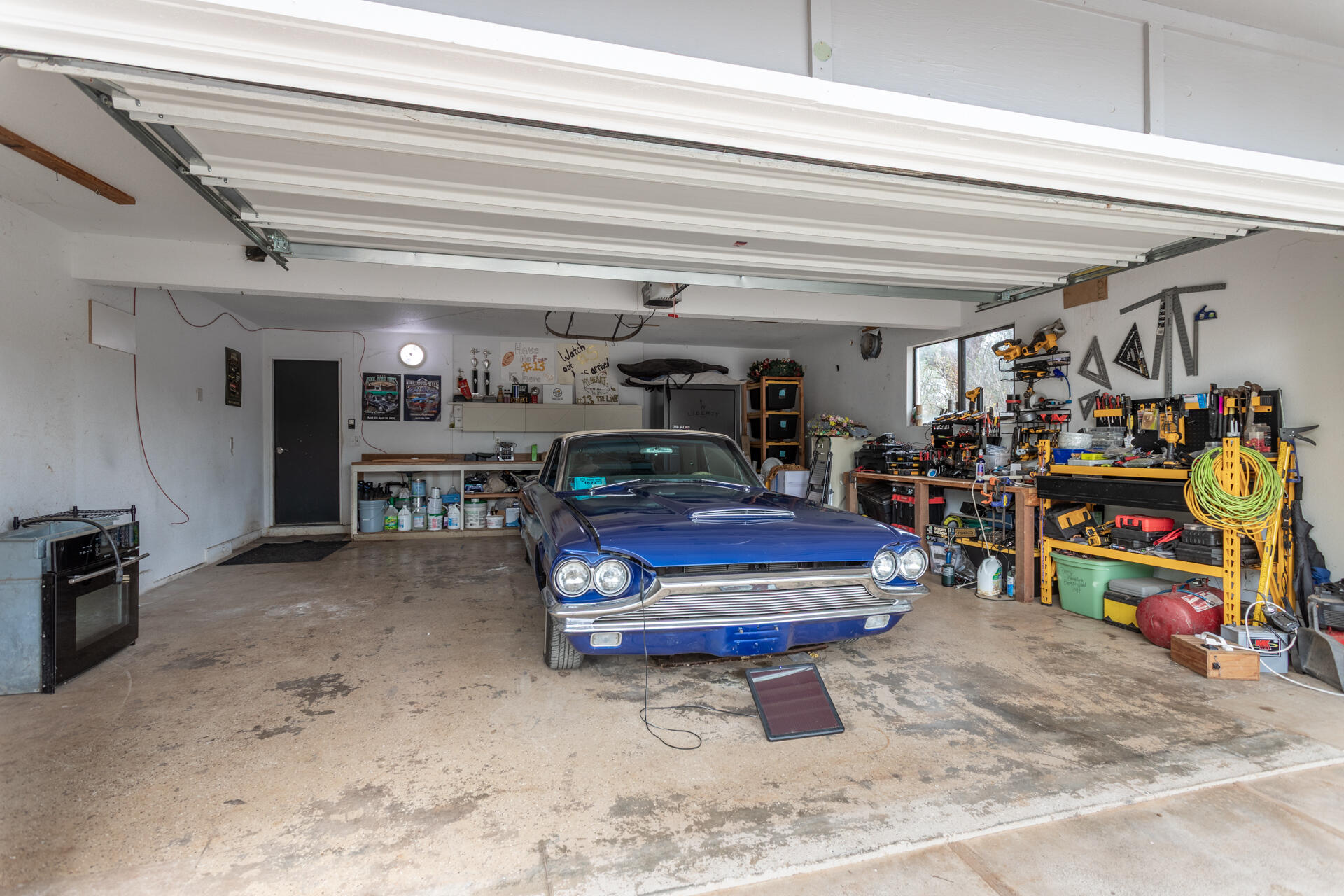 6188 Happy Valley Road Anderson, CA 96007 - Photo 4 of 58 a room with lots of furniture and clutter