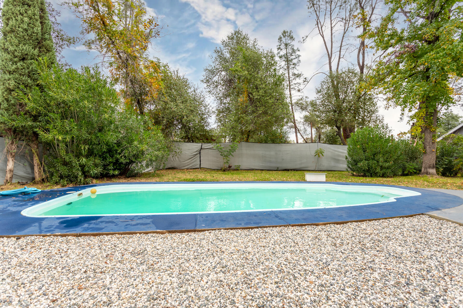 6188 Happy Valley Road Anderson, CA 96007 - Photo 47 of 58 a view of a swimming pool with an outdoor space