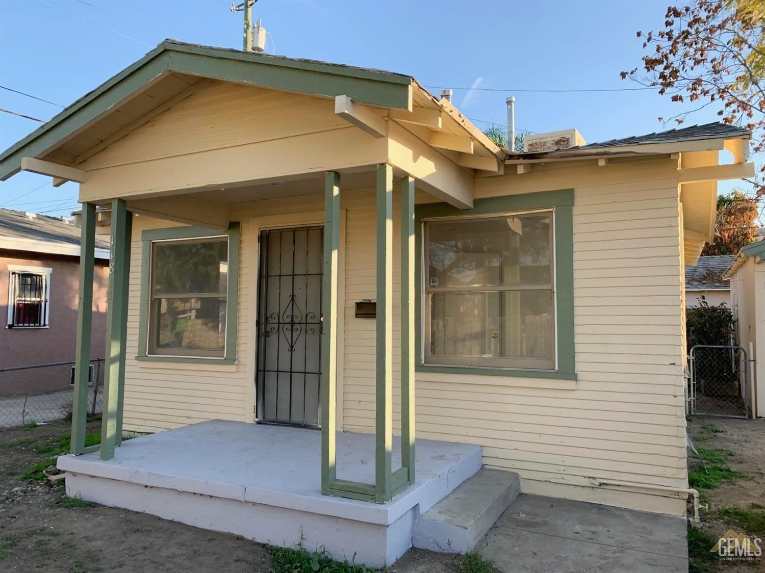 Undisclosed Address Bakersfield, CA 93304 - Photo 3 of 15 a view of a house with a yard