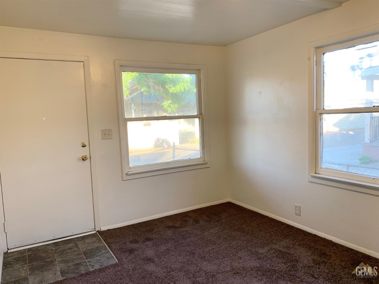Undisclosed Address Bakersfield, CA 93304 - Photo 6 of 15 an empty room with a window