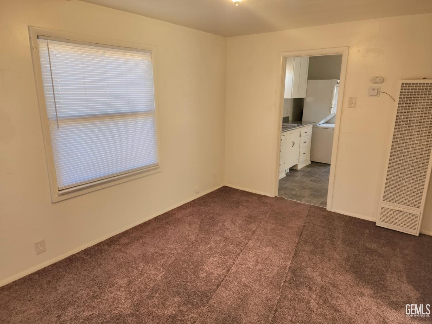 Undisclosed Address Bakersfield, CA 93304 - Photo 9 of 15 an empty room with a bathroom