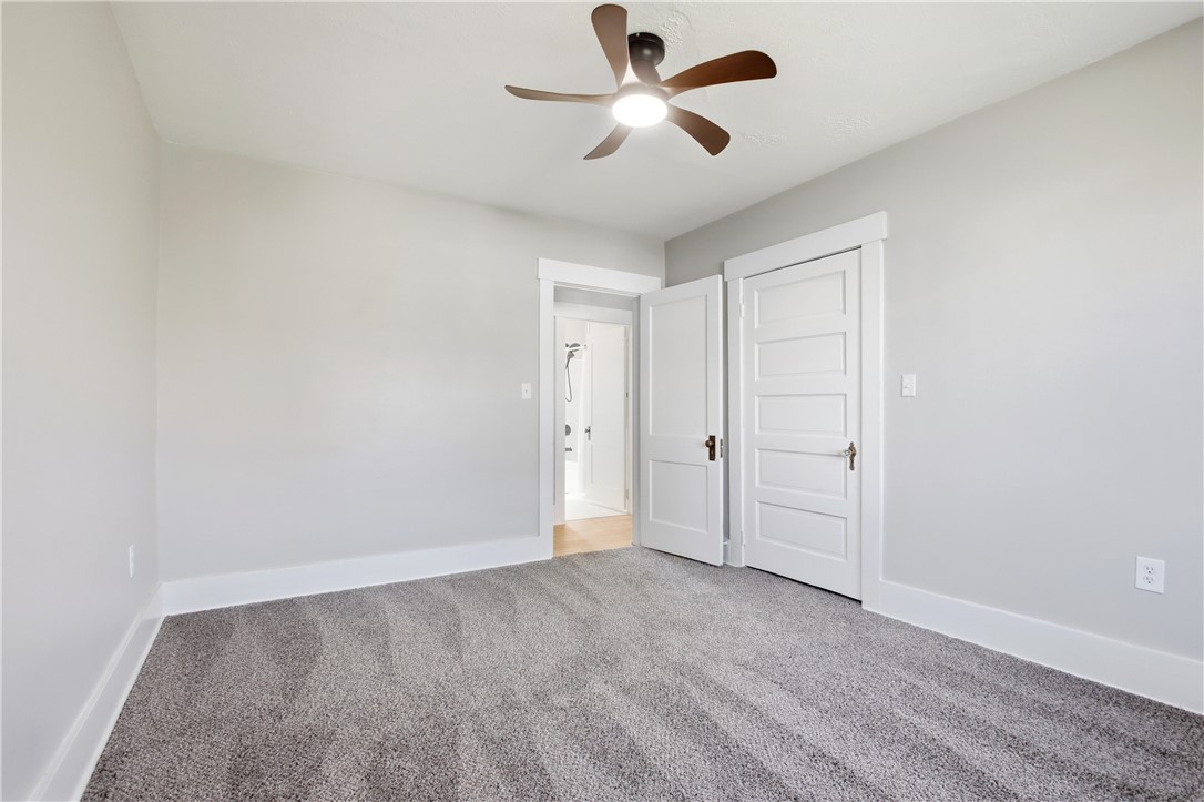 1925 Sunset Avenue Springfield, OH 45505 - Photo 30 of 45 This spacious room features cozy carpeting and a convenient ceiling fan for ultimate comfort.