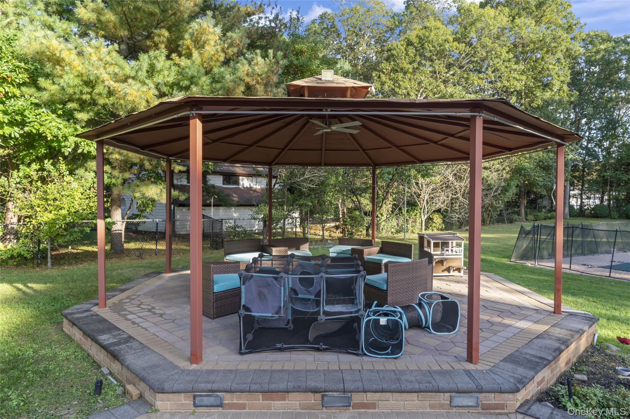 258 Half Hollow Road Dix Hills, NY 11746 - Photo 14 of 45 a view of backyard with barbeque grill and outdoor seating