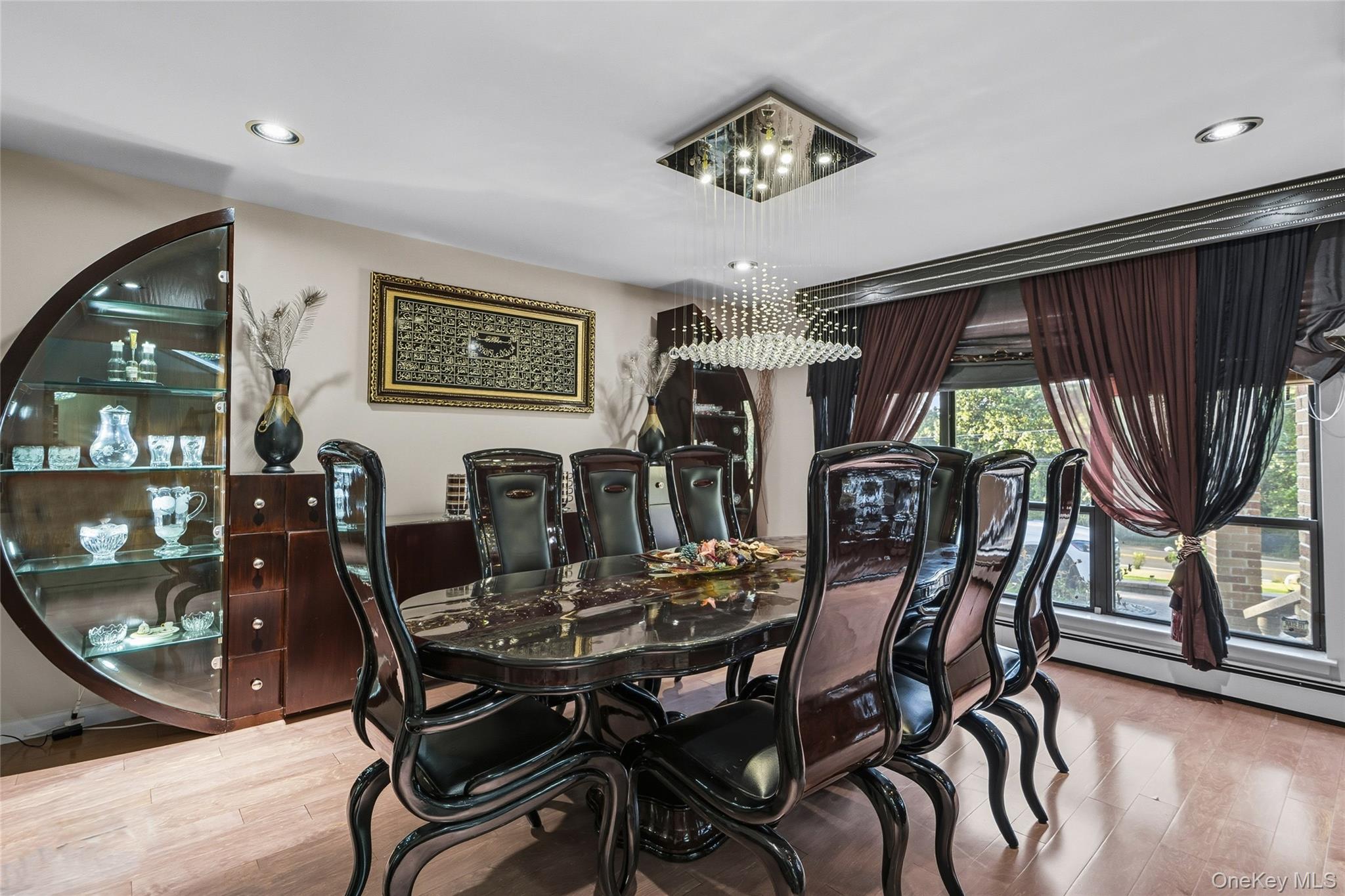 258 Half Hollow Road Dix Hills, NY 11746 - Photo 23 of 45 a view of a dining room with furniture window and wooden floor