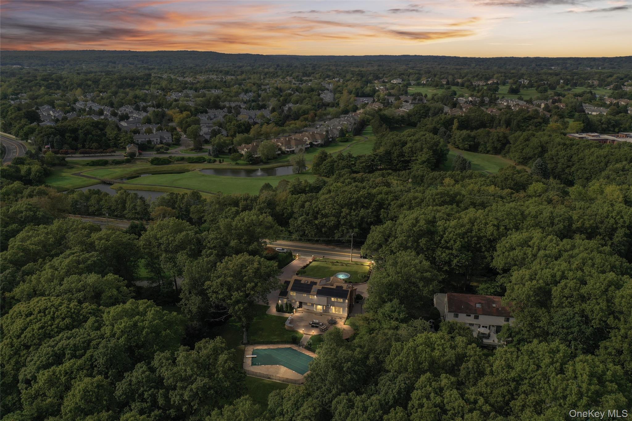 258 Half Hollow Road Dix Hills, NY 11746 - Photo 3 of 45 an aerial view of residential houses with outdoor space and trees