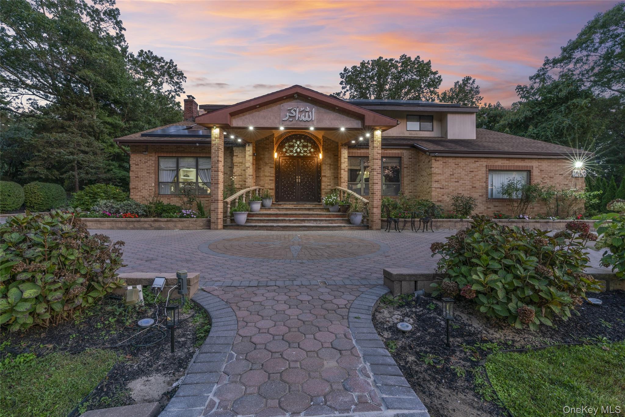 258 Half Hollow Road Dix Hills, NY 11746 - Photo 40 of 45 a front view of a house with garden