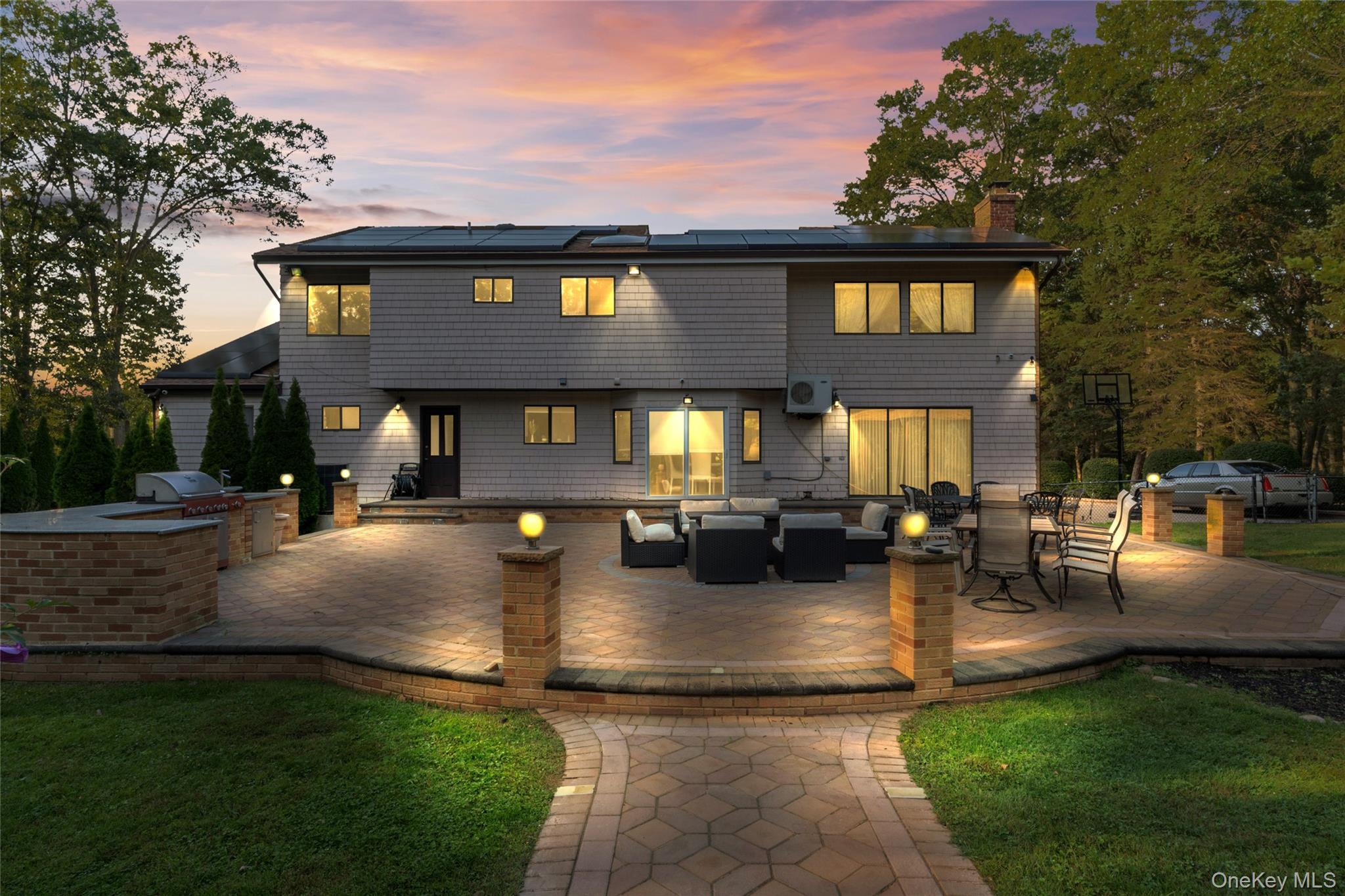 258 Half Hollow Road Dix Hills, NY 11746 - Photo 6 of 45 a view of a house with swimming pool and sitting area