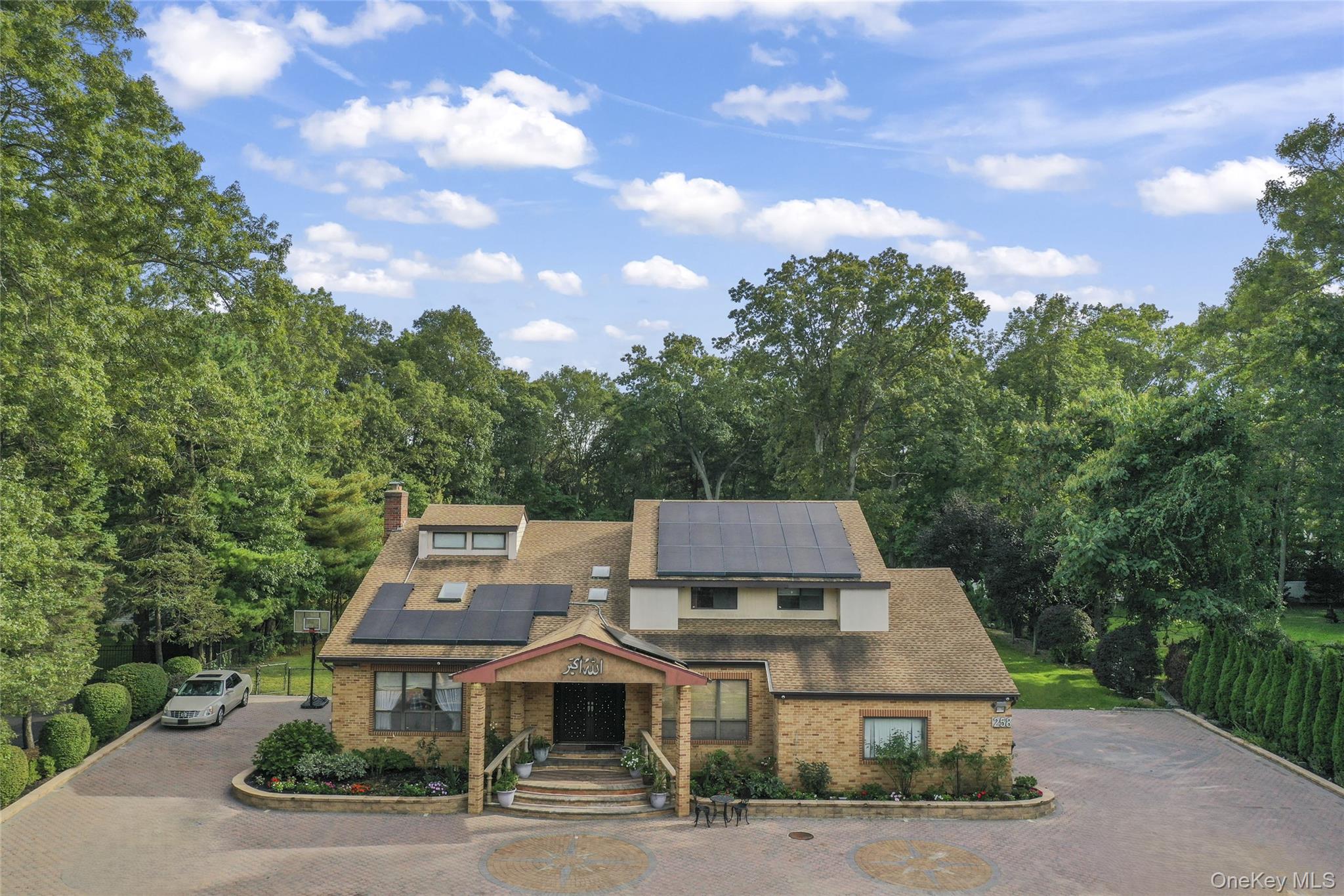 258 Half Hollow Road Dix Hills, NY 11746 - Photo 7 of 45 a view of a house with a yard