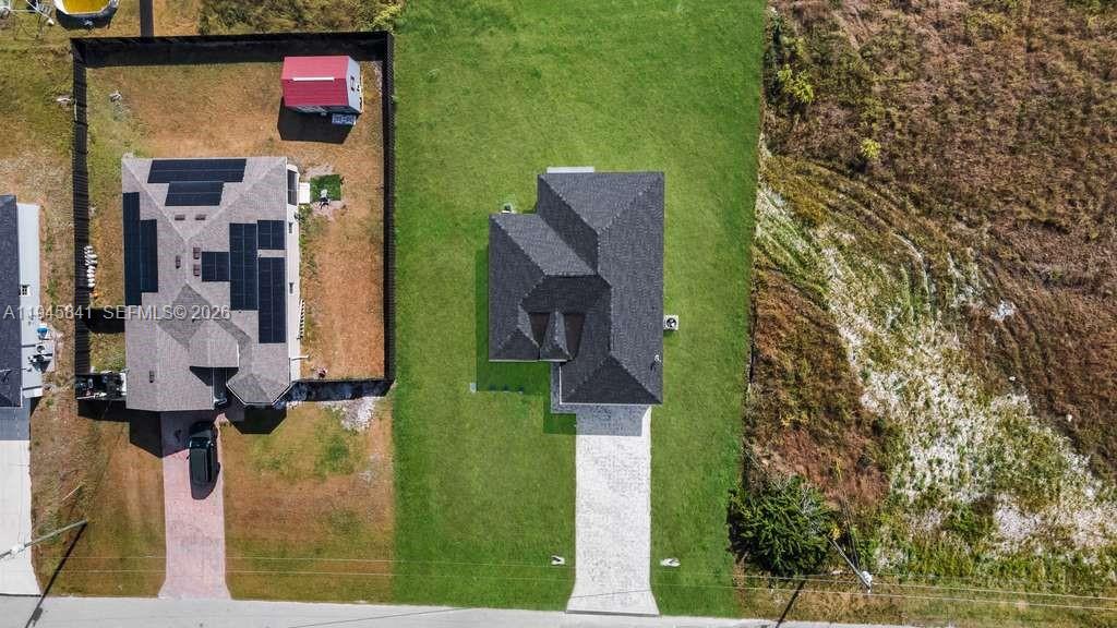 3210 10th Street Southwest, Unit 3210 Lehigh Acres, FL 33976 - Photo 6 of 29 a bird view of a house