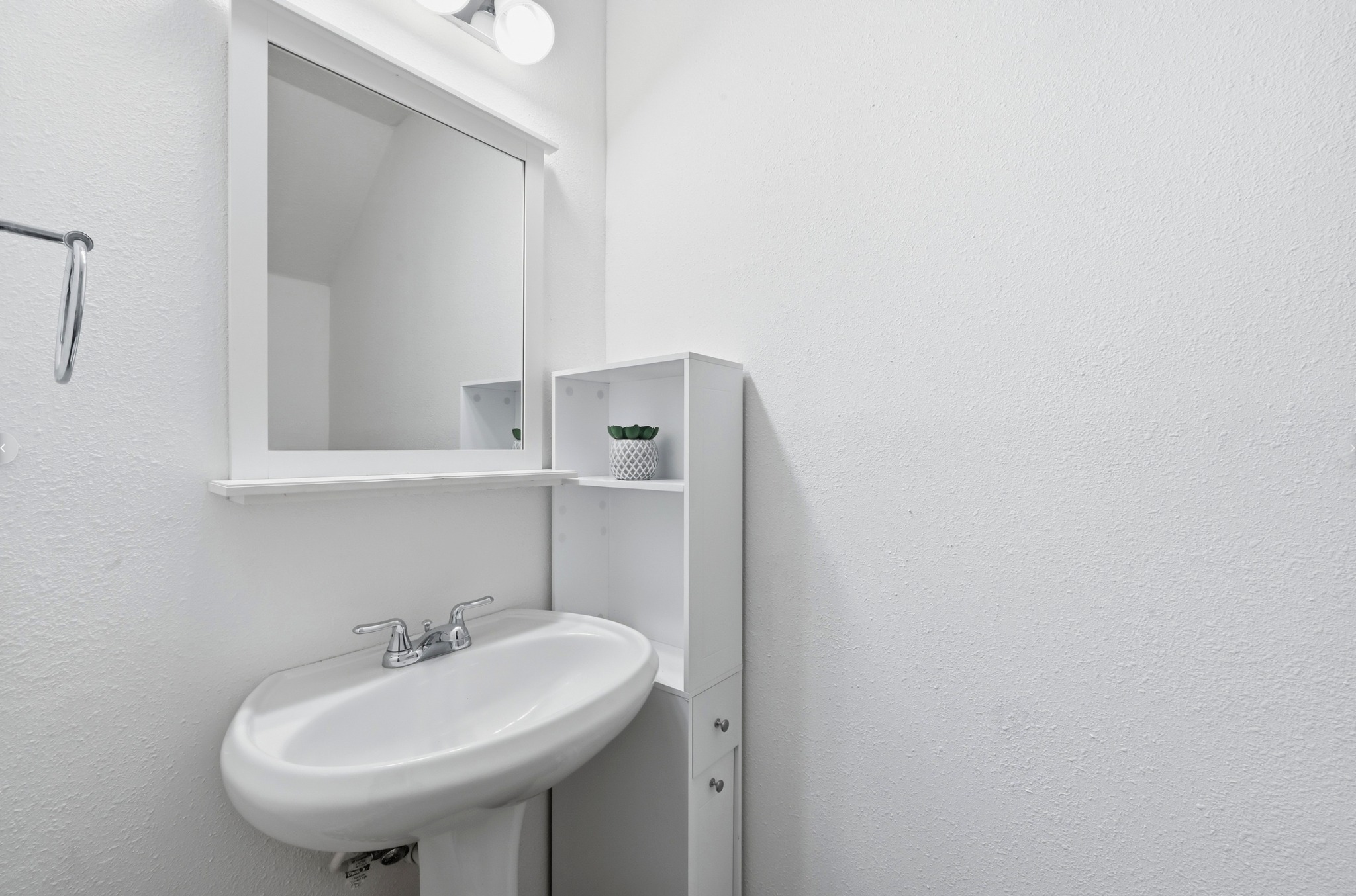 1504 Allen Road, Unit B Austin, TX 78746 - Photo 11 of 22 Powder room downstairs