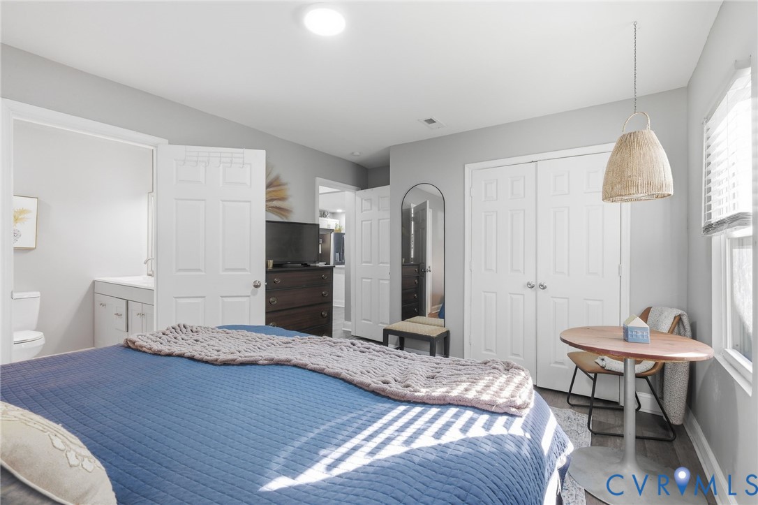 102 Spring Street Petersburg, VA 23803 - Photo 11 of 24 Bedroom with a closet and ensuite bathroom