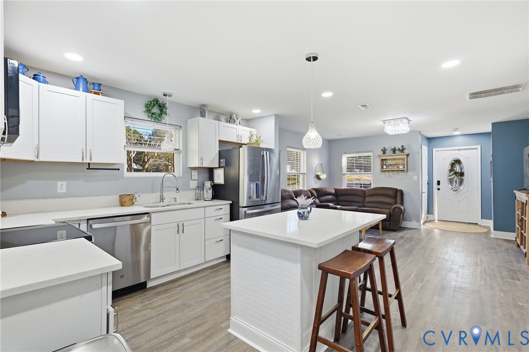 102 Spring Street Petersburg, VA 23803 - Photo 24 of 24 Kitchen featuring open floor plan, stainless steel