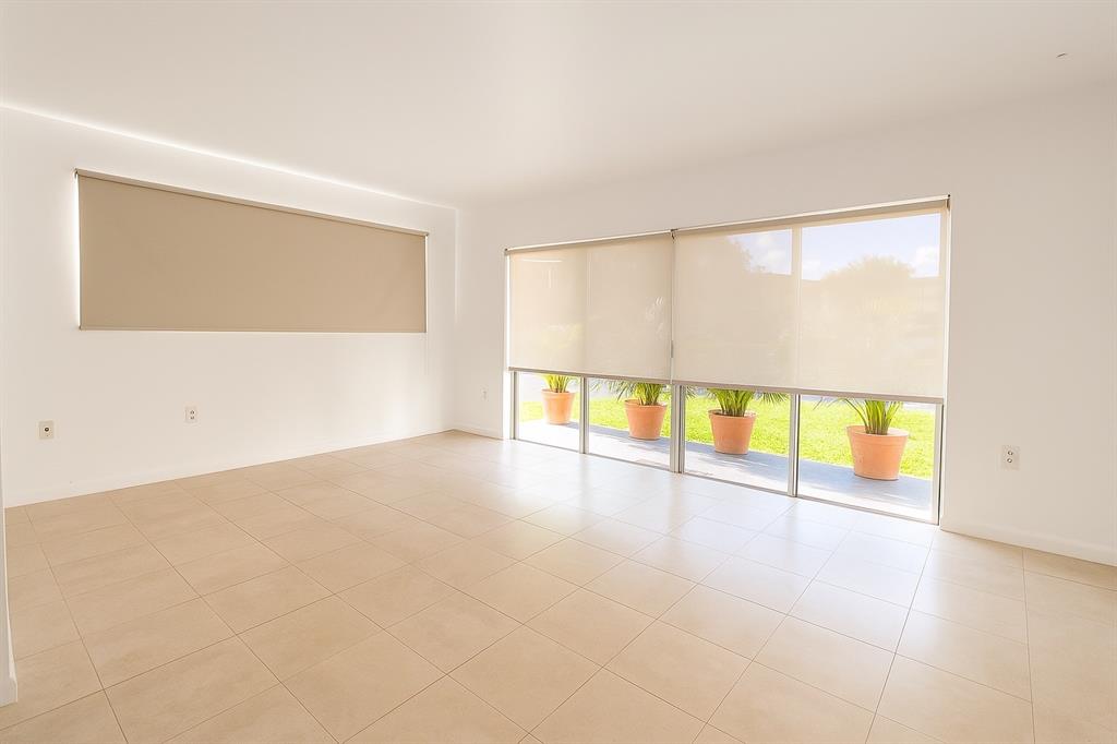 7320 Southwest 82nd Street Miami, FL 33143 - Photo 3 of 8 an empty room with a large window