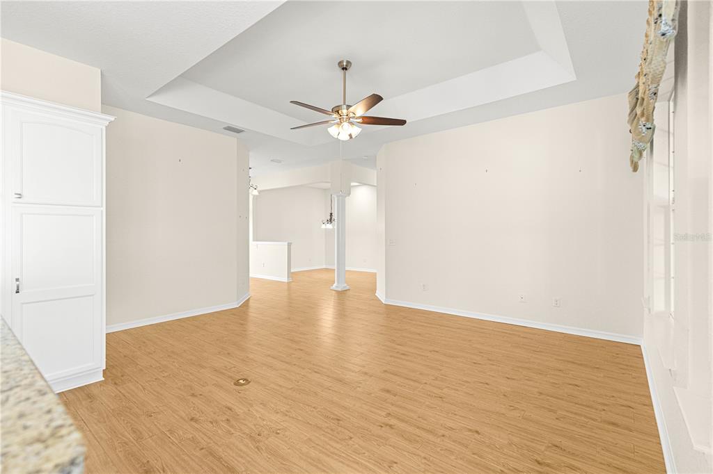17306 Southeast 112th Court Road Summerfield, FL 34491 - Photo 19 of 42 wooden floor in an empty room