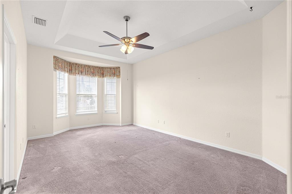 17306 Southeast 112th Court Road Summerfield, FL 34491 - Photo 30 of 42 a view of an empty room with a window