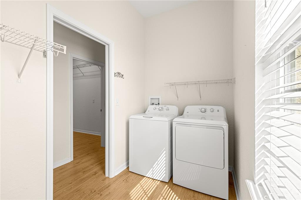 17306 Southeast 112th Court Road Summerfield, FL 34491 - Photo 36 of 42 a utility room with dryer and washer