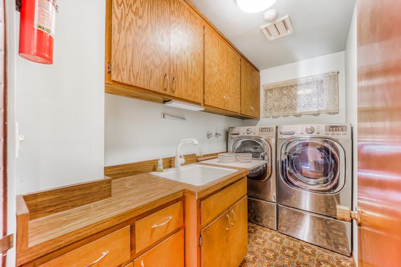 11 Senior Avenue Berkeley, CA 94708 - Photo 17 of 38 a utility room with dryer and washer