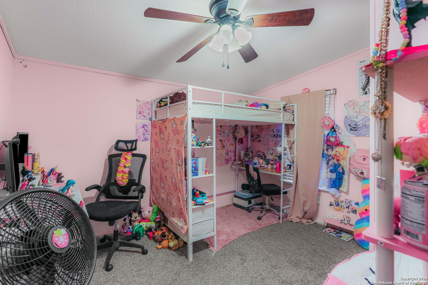 12925 Luckey Road Atascosa, TX 78002 - Photo 21 of 50 a bedroom with bed and a chandelier