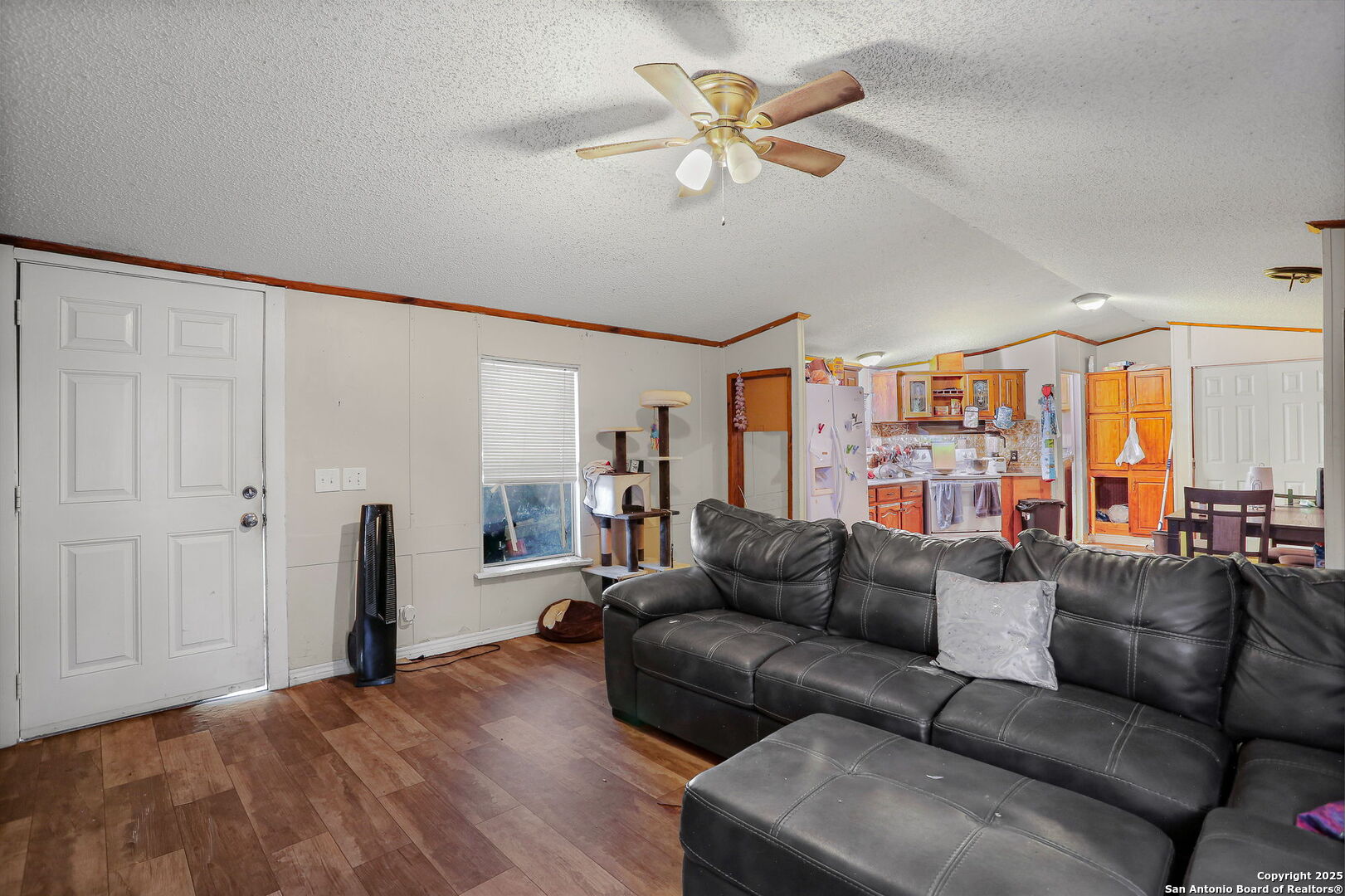 12925 Luckey Road Atascosa, TX 78002 - Photo 28 of 50 a living room with furniture and a large window
